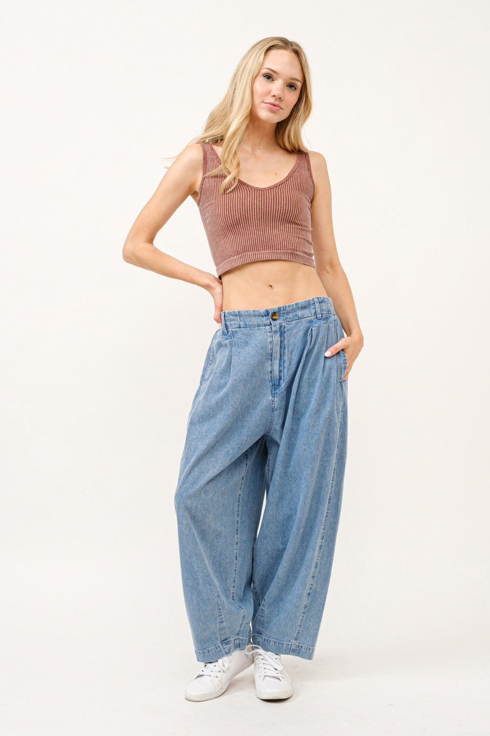 Boho wide leg elastic back pleated baggy jeans with pockets in light blue denim.