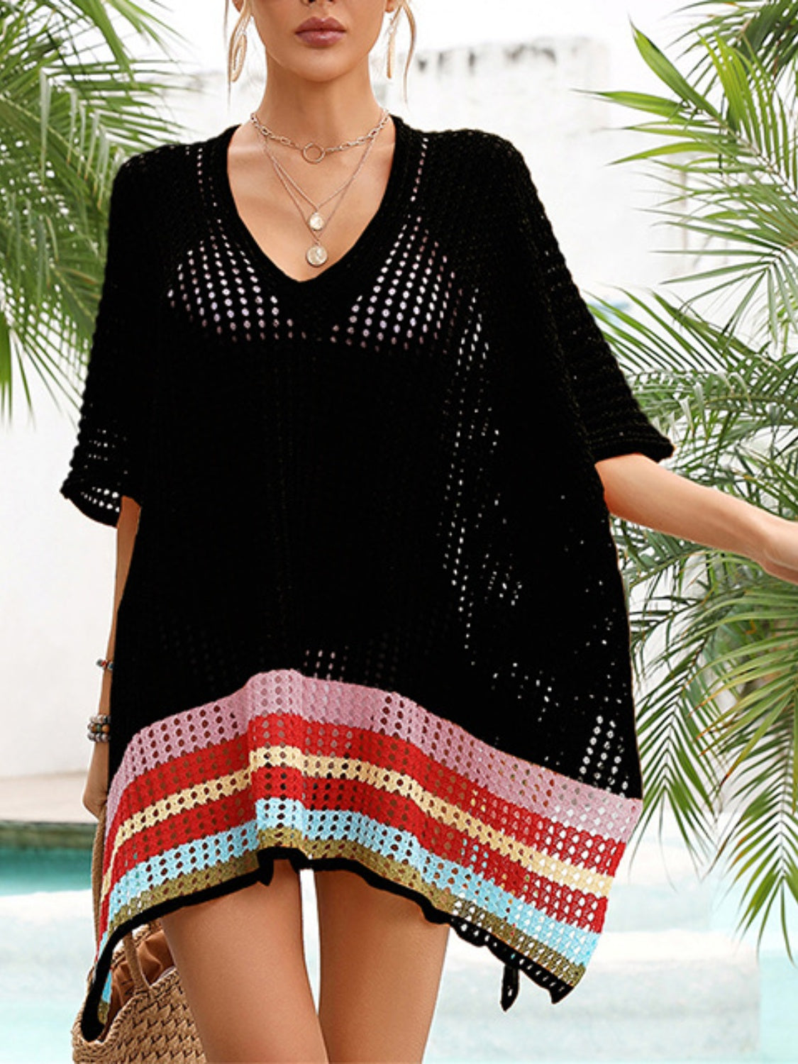 Slit Openwork V-Neck Half Sleeve Cover-Up in black with colorful hem, 100% polyester.