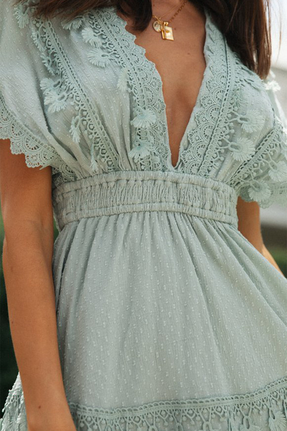 Lace detail plunge short sleeve mini dress in light blue with tied and opaque design.