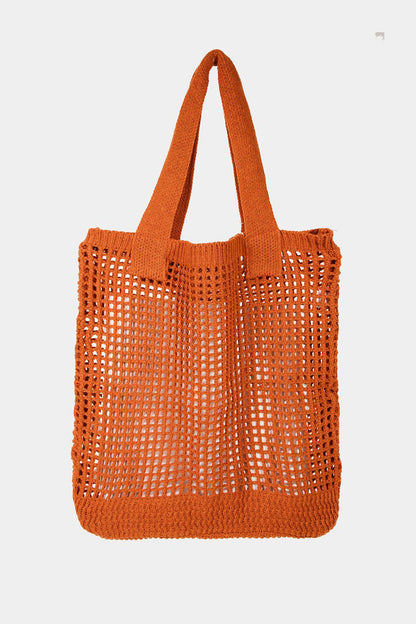 Medium pointelle knit crochet tote bag in polyester, 14x14 inches.