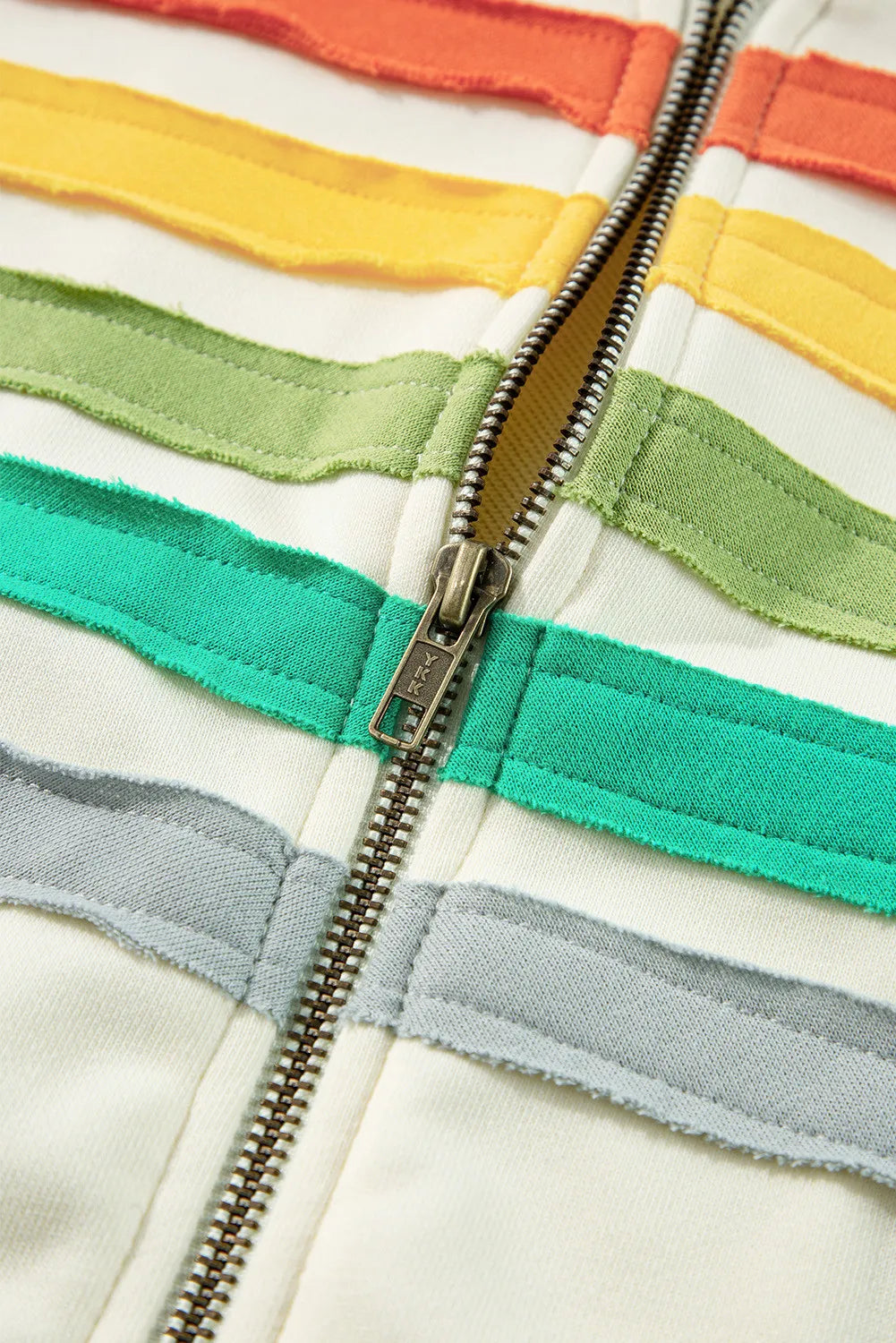 Rainbow drawstring zip up hoodie with colorful stripes and long sleeves.