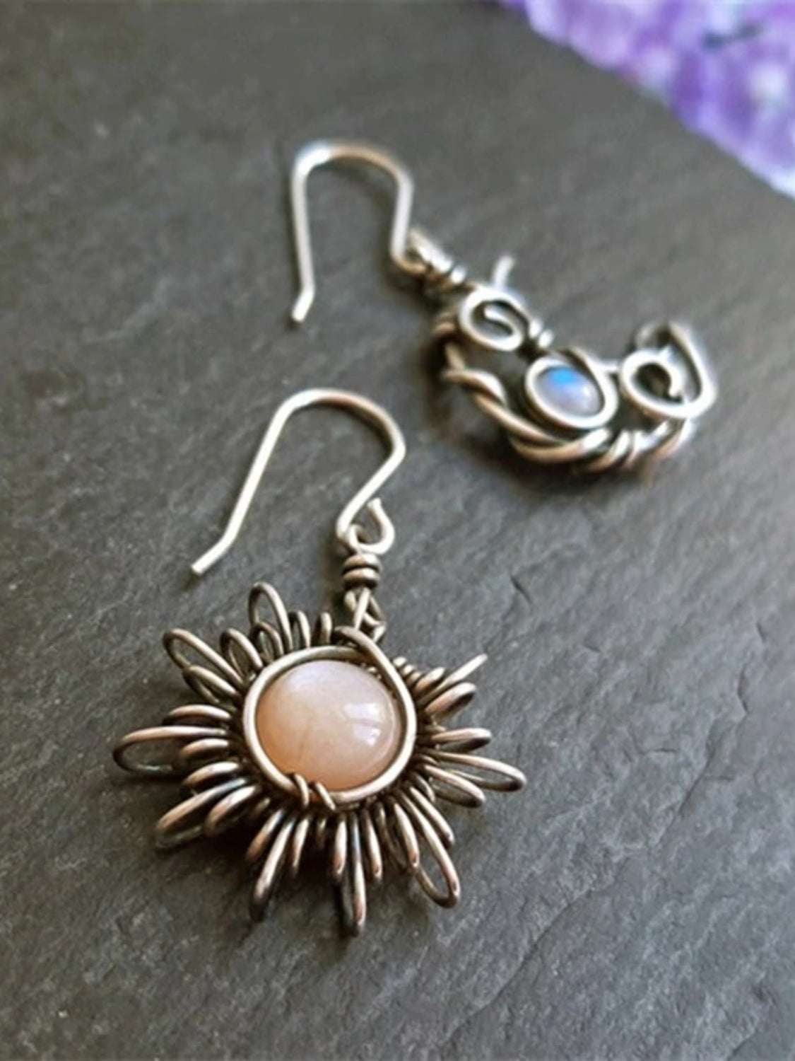 Moon & Sun dangle earrings with moonstone and alloy, featuring celestial designs.