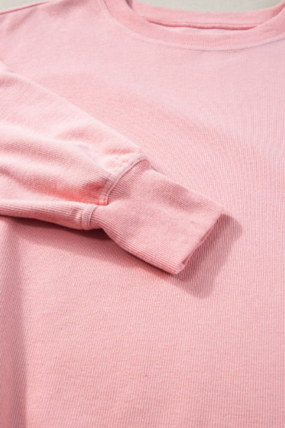 Round neck long sleeve sweatshirt in pink with cuff detail.