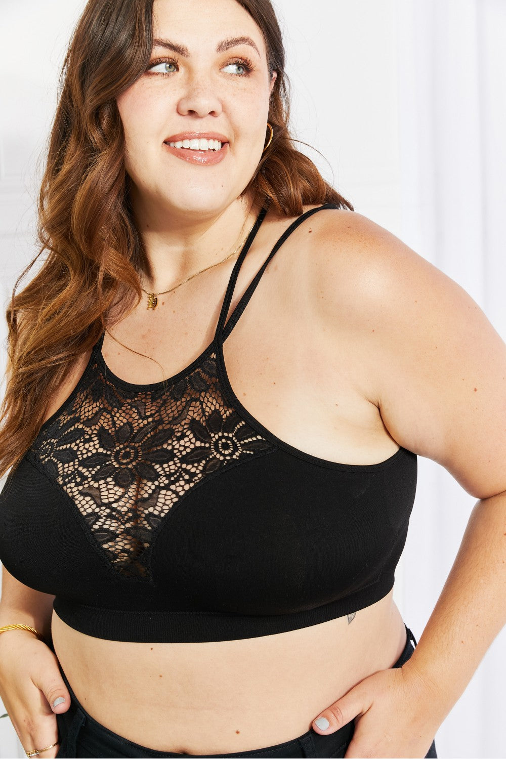 Plus-size model wearing a Romantic Night Lace Cutout Bralette with double-strap detail.