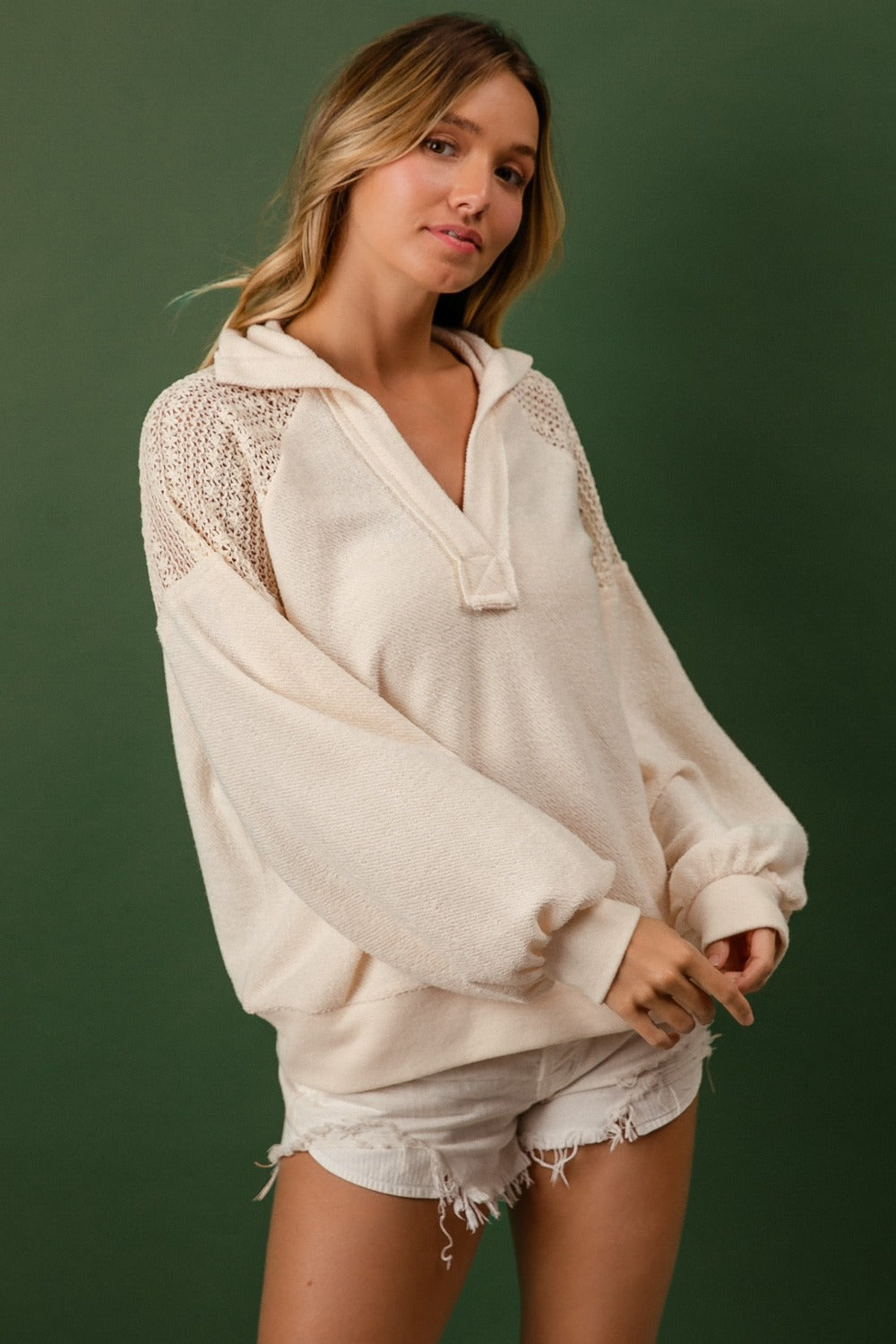 French Terry Lace Shoulder Top with delicate lace accents and cozy fabric.