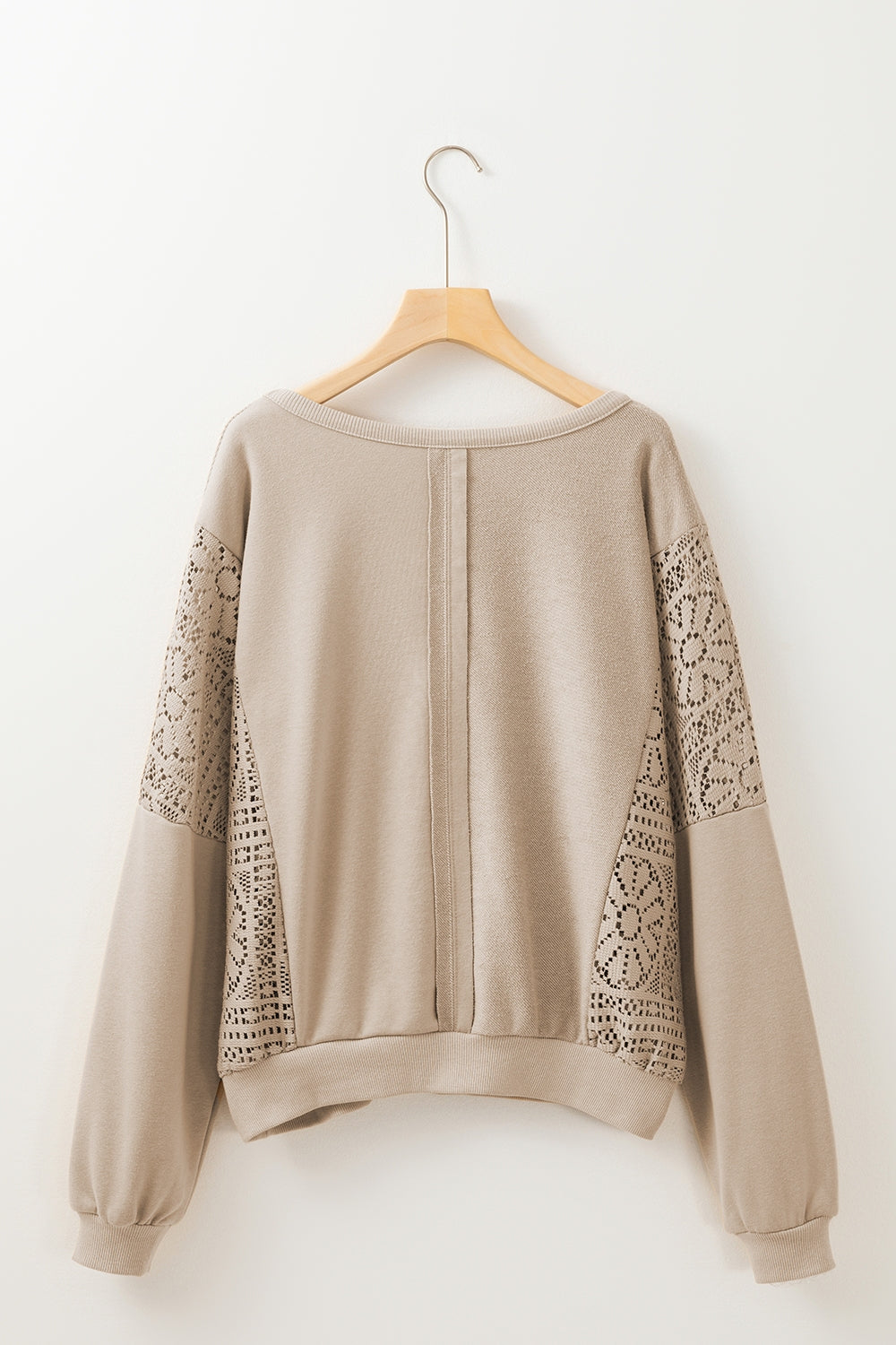 Boho crochet round neck long sleeve sweatshirt with cutout detailing.