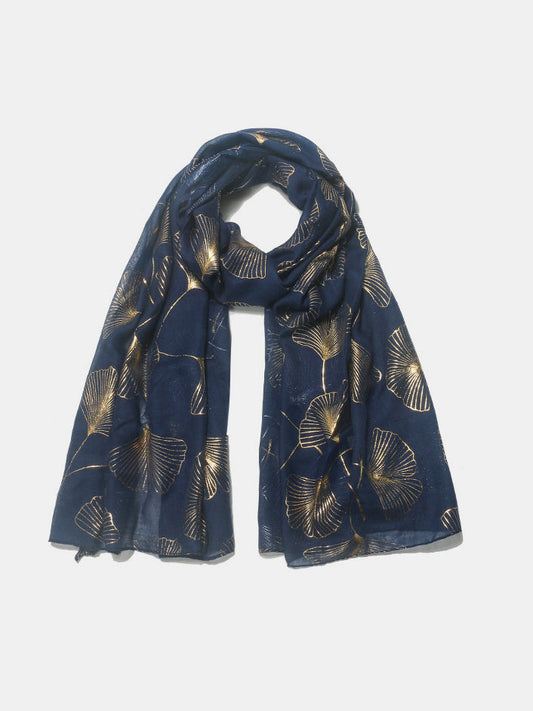 Navy blue polyester scarf with gold Ginkgo leaf pattern.