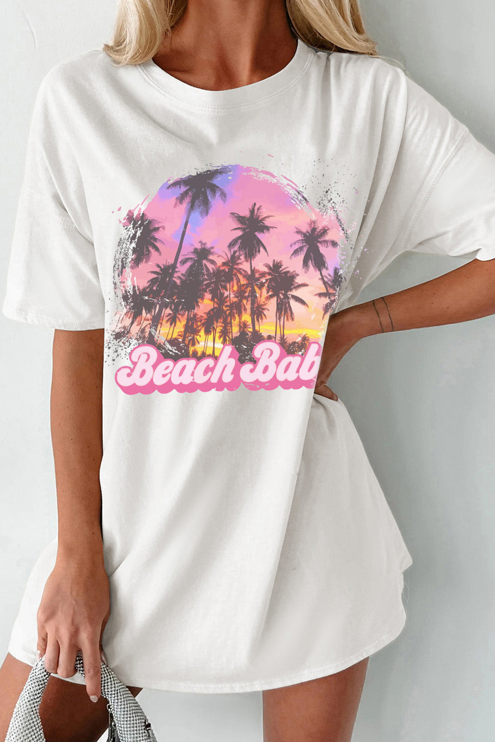 Beach Babe Graphic T-Shirt featuring palm tree print and "Beach Babe" text, basic style, slightly stretchy cotton blend.