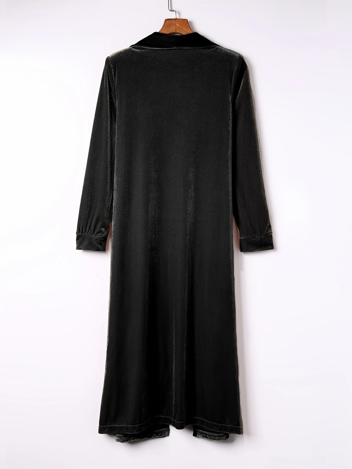 Open front long sleeve coat in black polyester fabric.