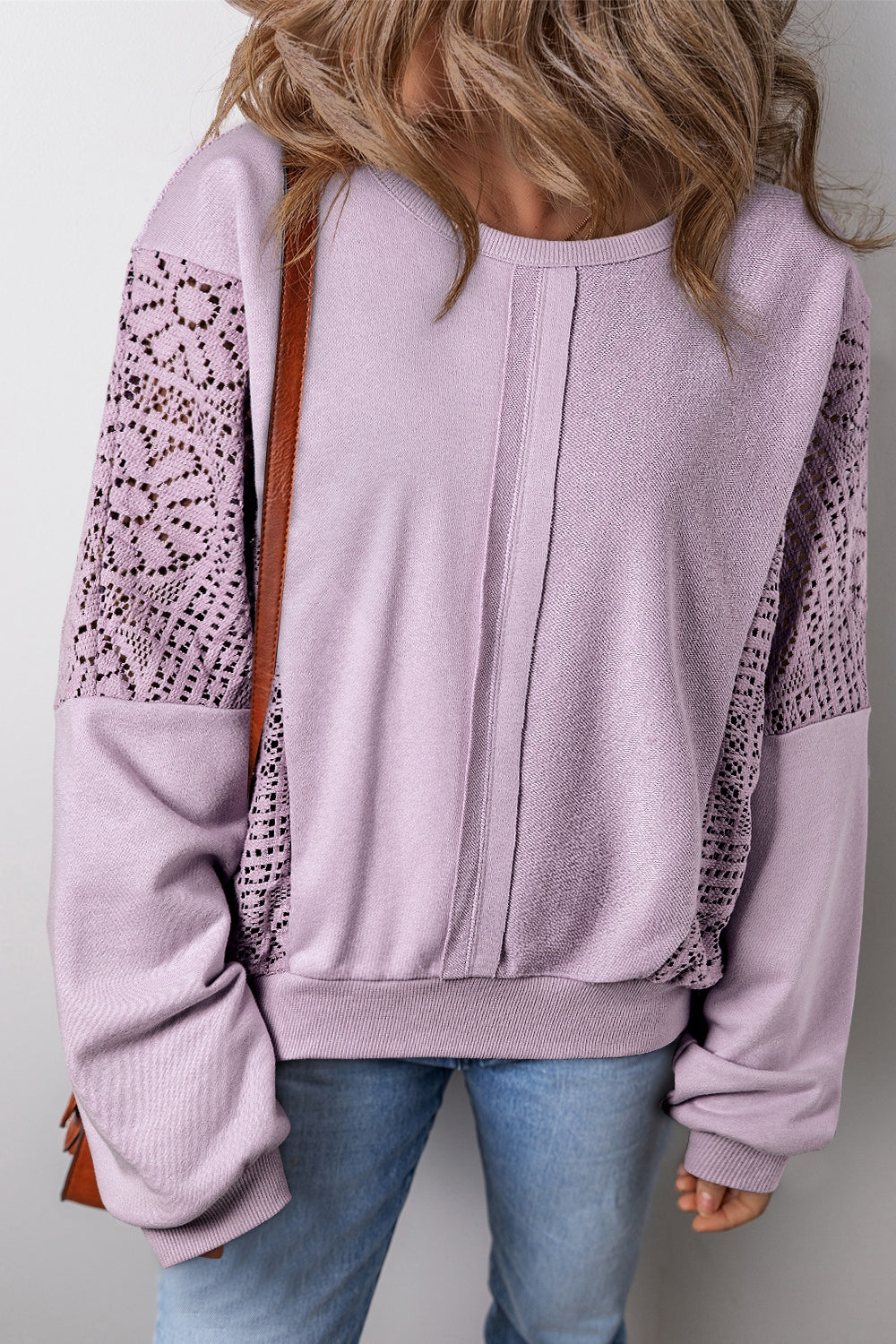 Boho crochet round neck long sleeve sweatshirt with cutout design, slightly stretchy material, in light lavender.