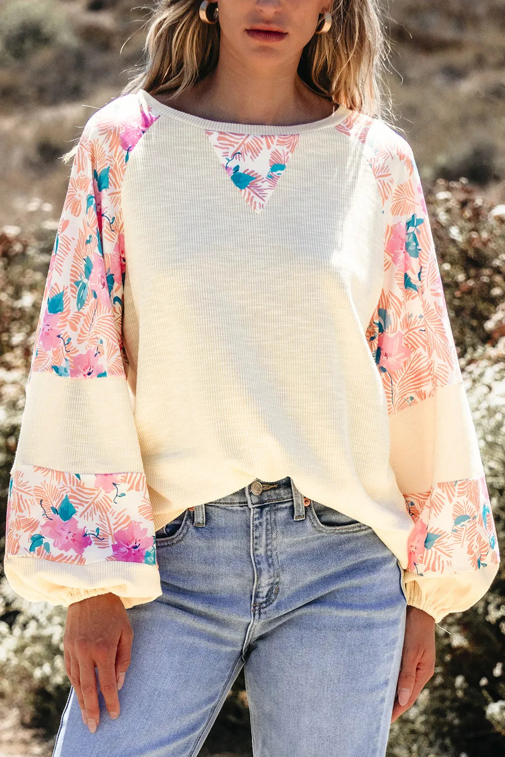 Printed round neck balloon sleeve blouse with floral pattern, polyester-cotton blend.