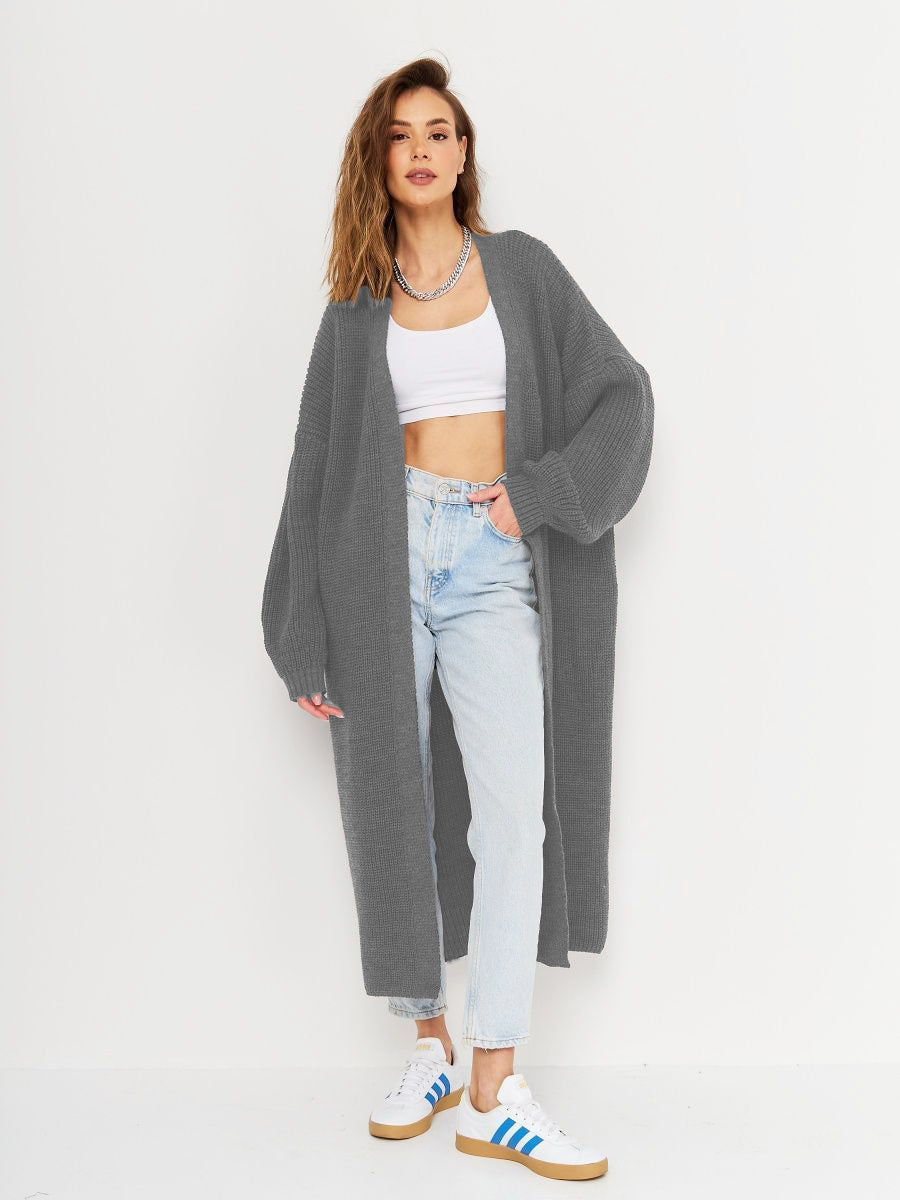 Open front long sleeve longline cardigan in gray with moderate stretch, made of 100% polyester.