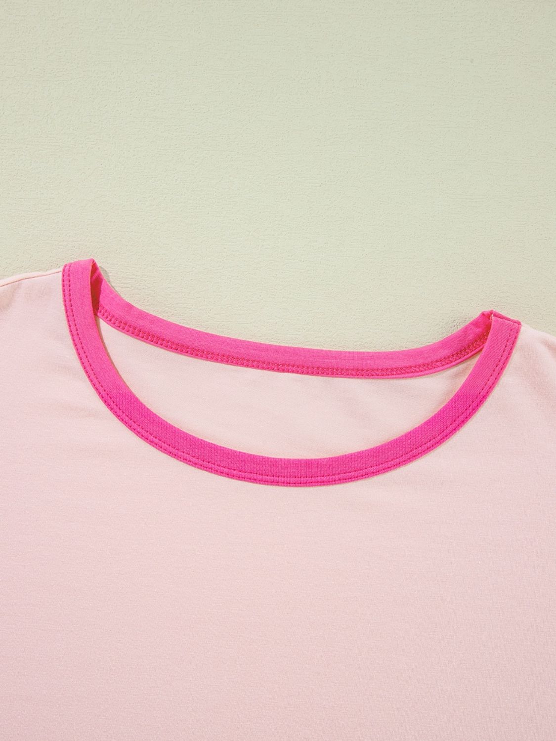 Vacay Color Block Graphic T-Shirt with pink neckline detail.