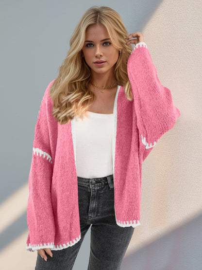 Super Cozy Open Cardigan in pink with slightly stretchy polyester fabric, shown on a model.