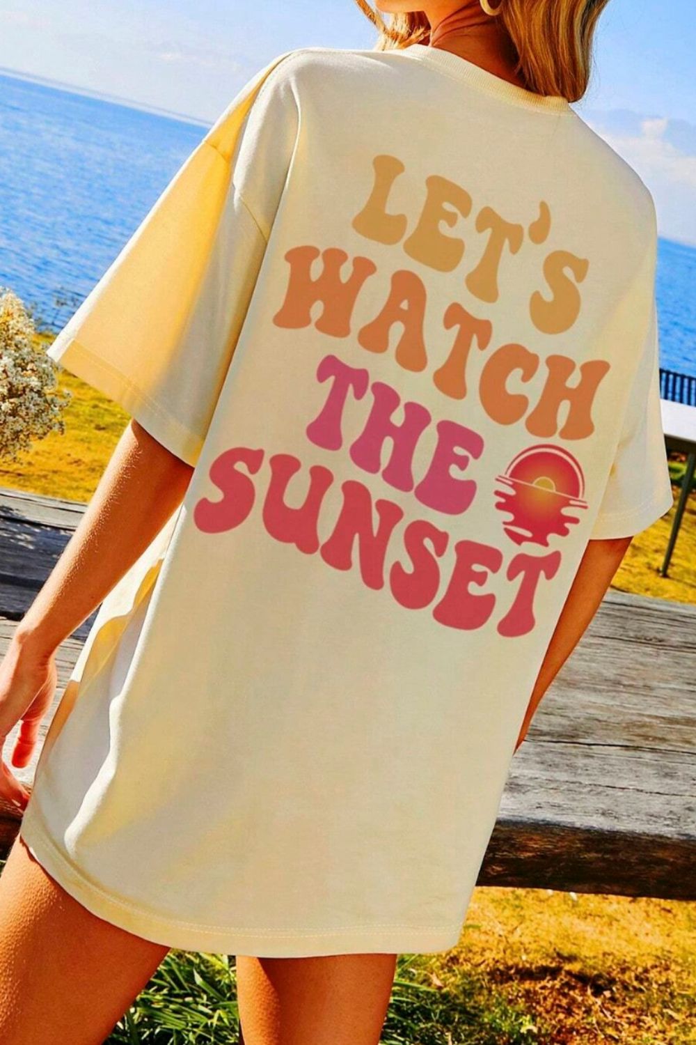 Let's Watch The Sunset T-Shirt with sunset graphic design, polyester fabric, worn outdoors.