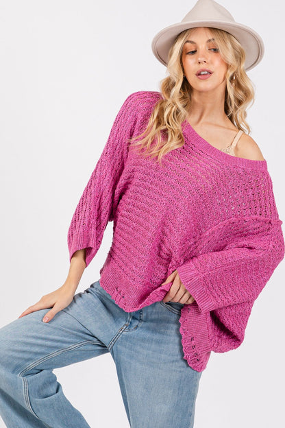 Distressed asymmetrical open stitch magenta sweater with half sleeves.