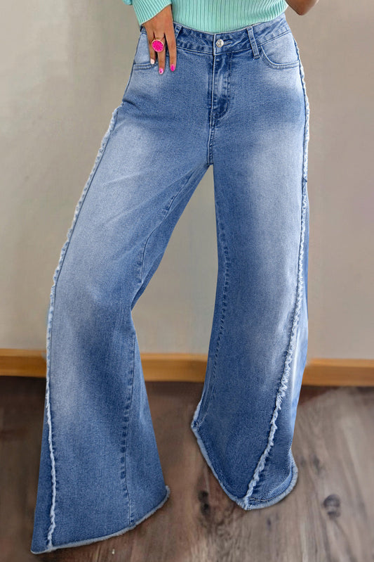 Vintage stitching raw hem flared jeans for a trendy, edgy look.