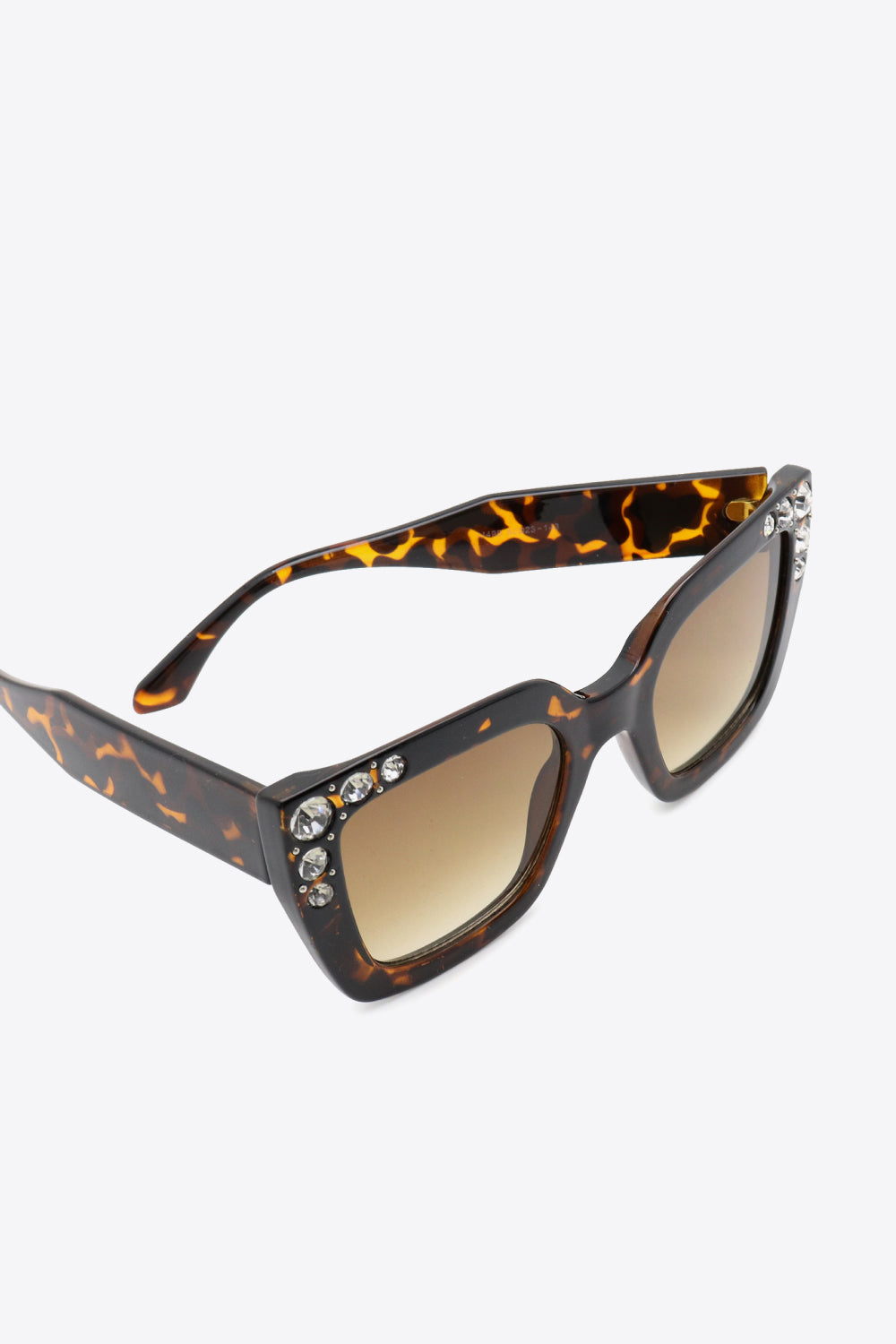 Oversized rhinestone sunglasses with UV400 polycarbonate wayfarer frame.