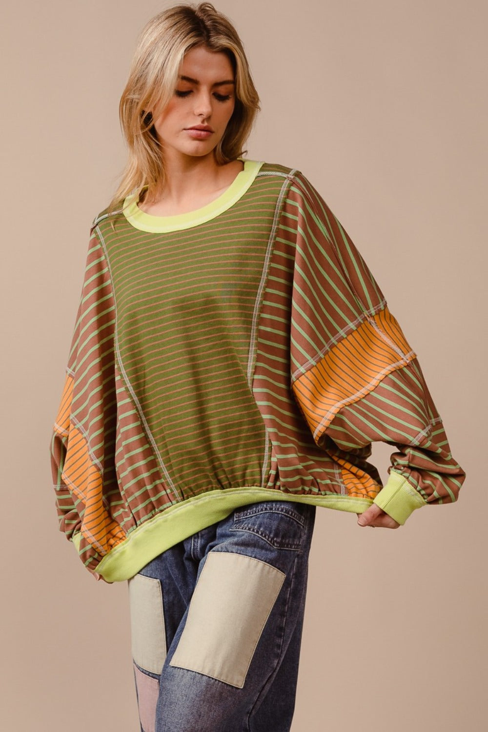 Color Block Striped Round Neck Sweatshirt with bold complementary stripes.