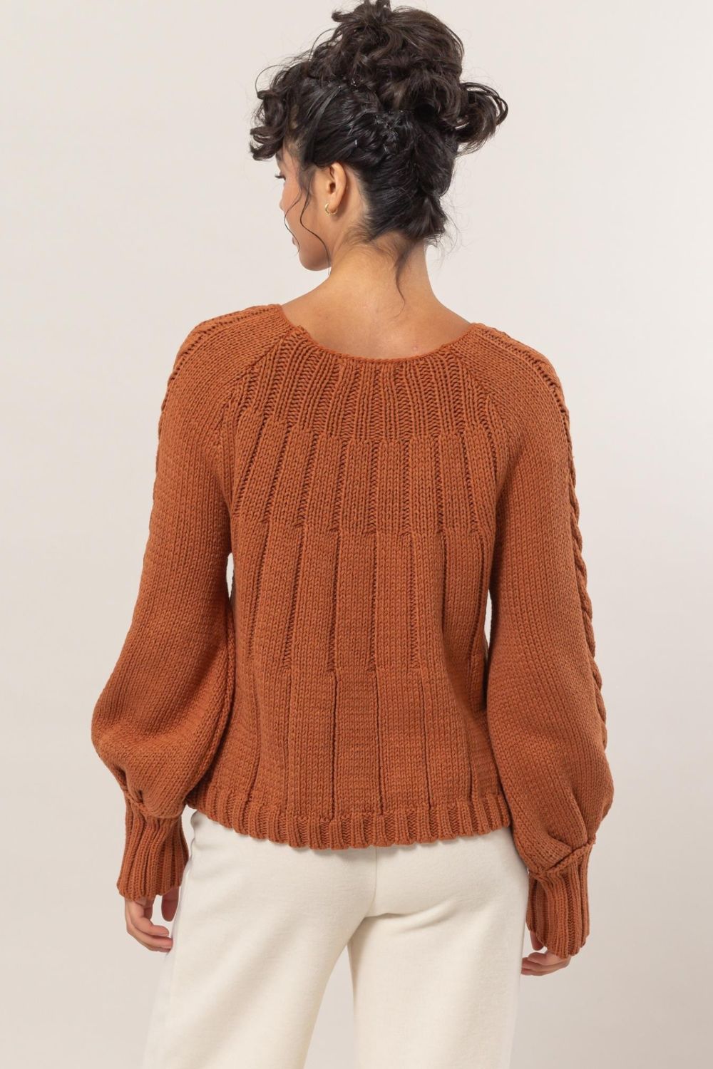 Cable Knit Round Neck Raglan Sleeve Sweater in brown, featuring a classic design and flattering silhouette.