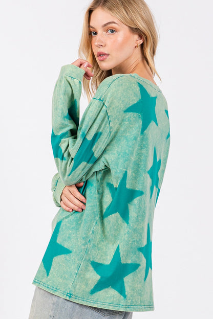 Mineral wash star pattern T-shirt with long sleeves and edgy design.