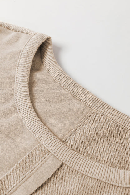 Boho crochet round neck long sleeve sweatshirt in beige with detailed close-up of fabric texture.