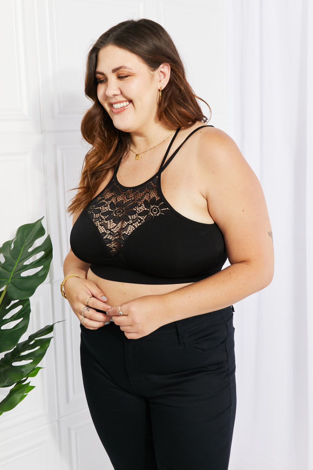 Plus-size model wearing Romantic Night Lace Cutout Bralette with double-strap detail.