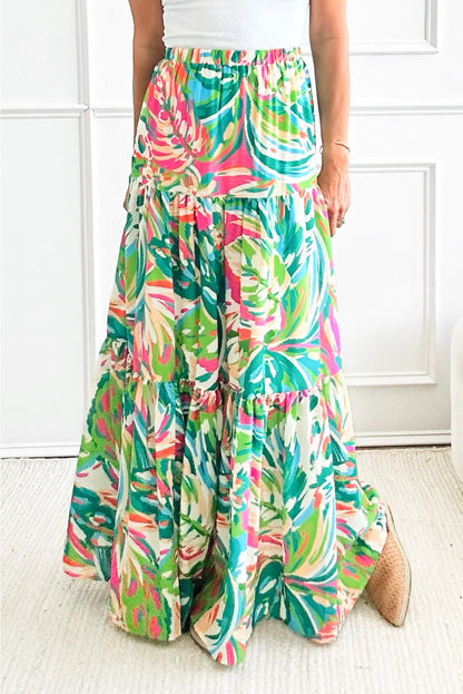 Green abstract printed high waist tiered maxi skirt with flowy design.