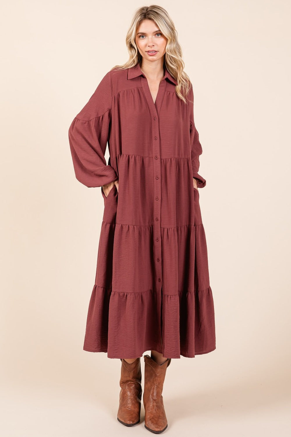 Long sleeve midi dress with button-down front and tiered design in brown.