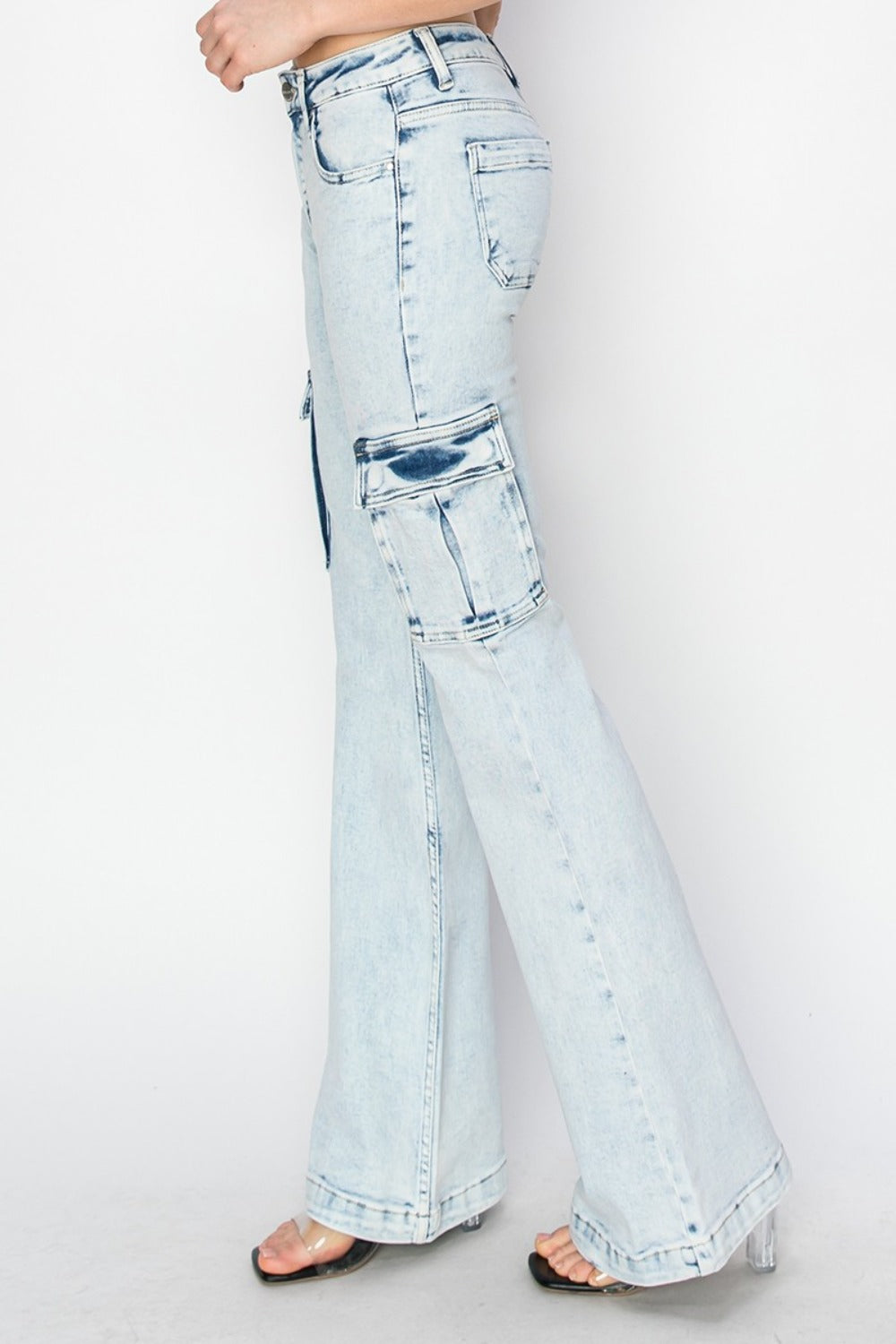 High Rise Light Wash Cargo Flare Jeans with pockets and flared leg design.