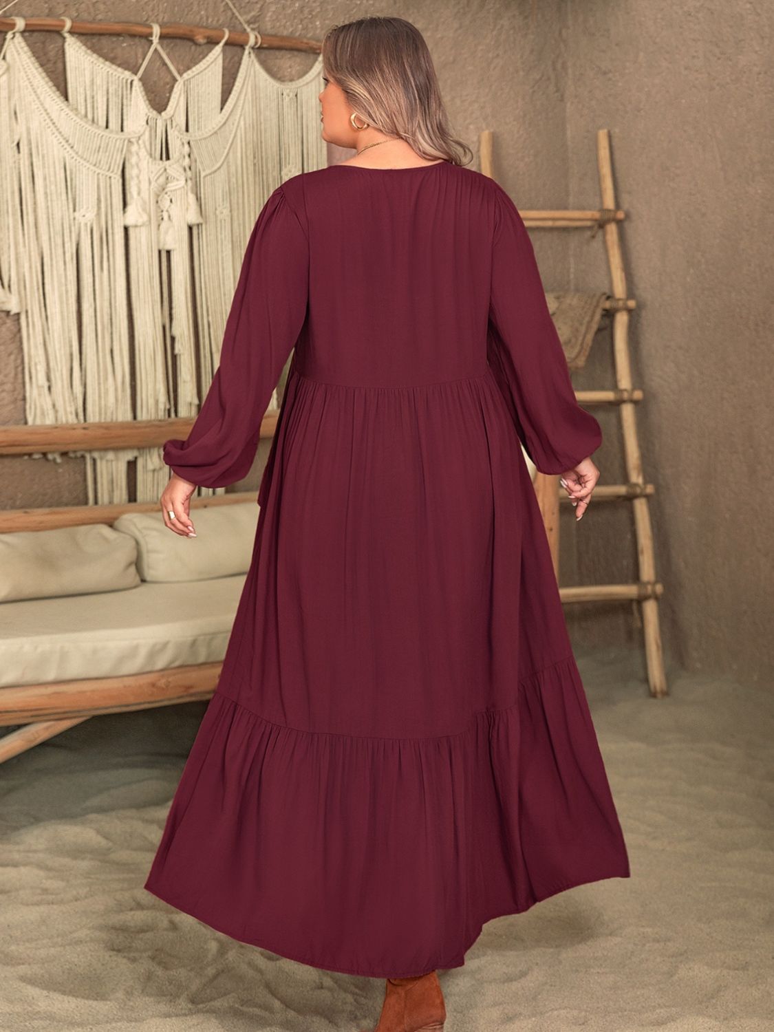 Plus size ruffled V-neck long sleeve dress in deep burgundy color.