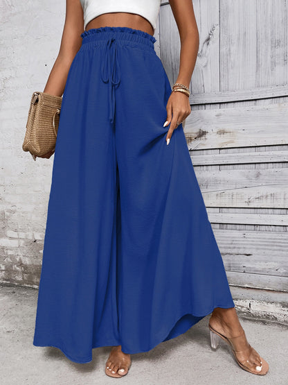 Boho high waist wide leg pants with tie detail in blue cotton fabric.