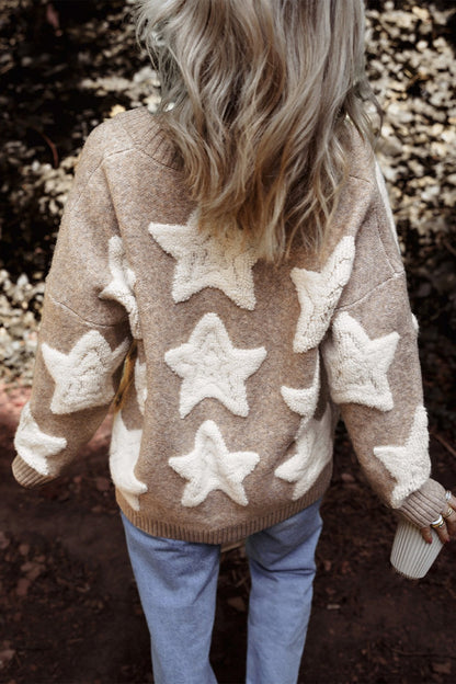 Star print button up cardigan with beige color and white star patterns.