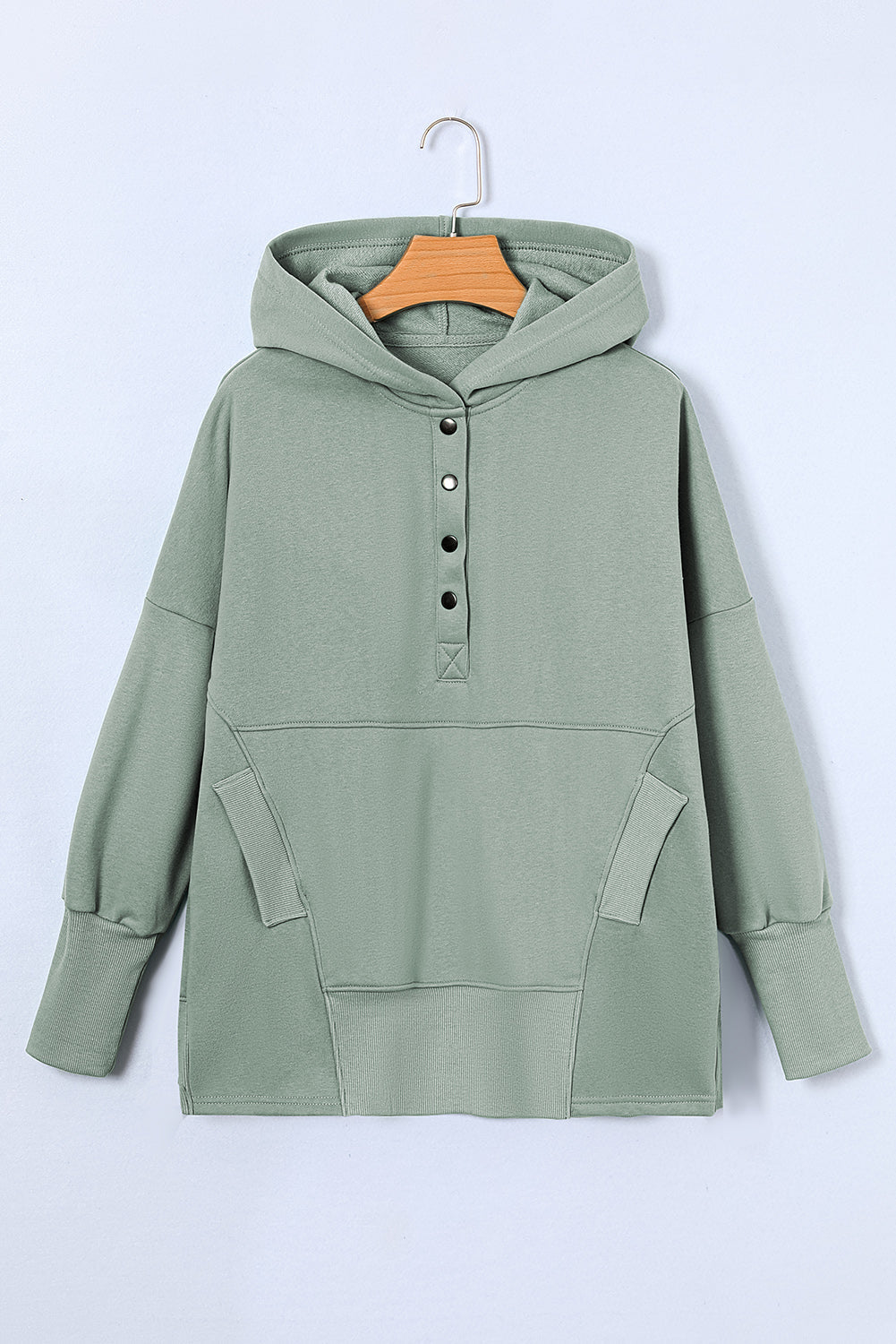 Quarter-Snap Dropped Shoulder Hoodie, pocketed and buttoned, polyester-cotton blend, green color.