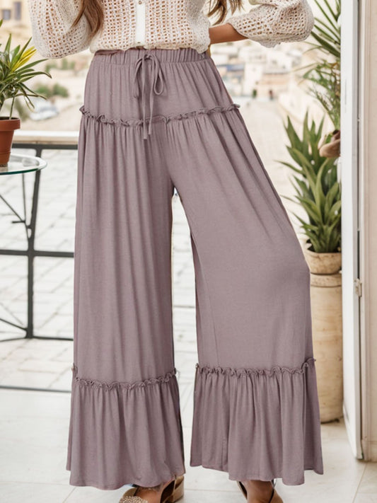 Women's wide leg ruffle trim pants in a boho style with a high waist.